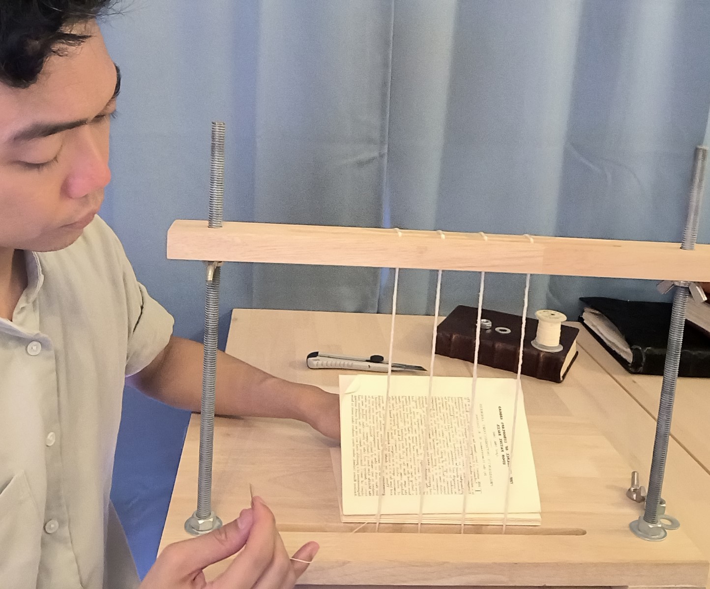 Re-sewing folios of an old book